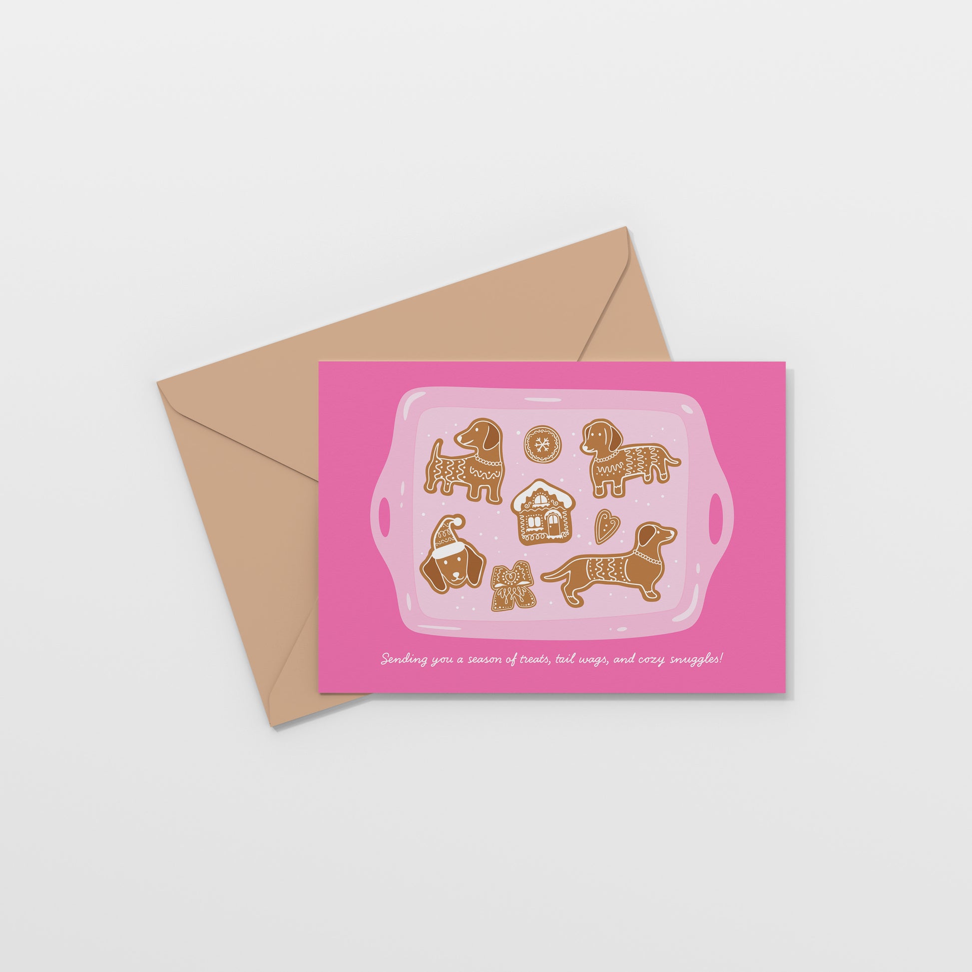 Pink gingerbread dogs on tray greeting card with brown envelope
